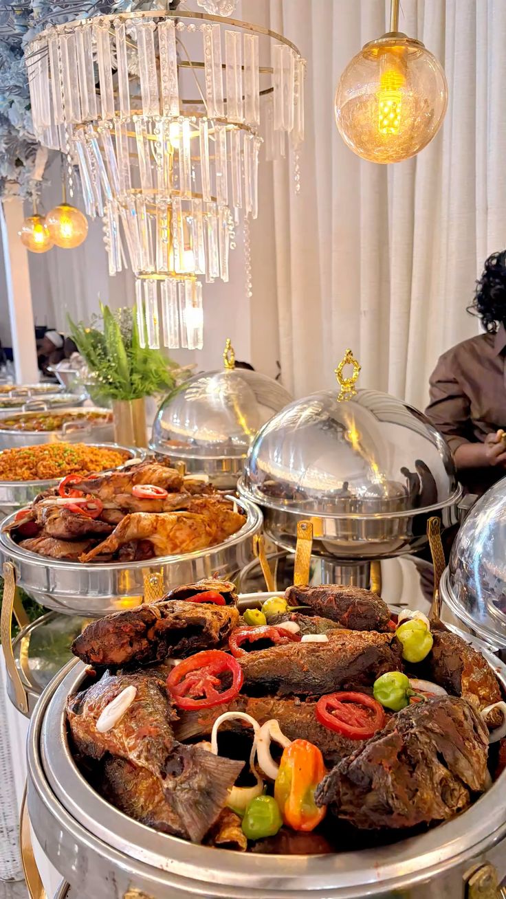 A professional chef plating a catered meal